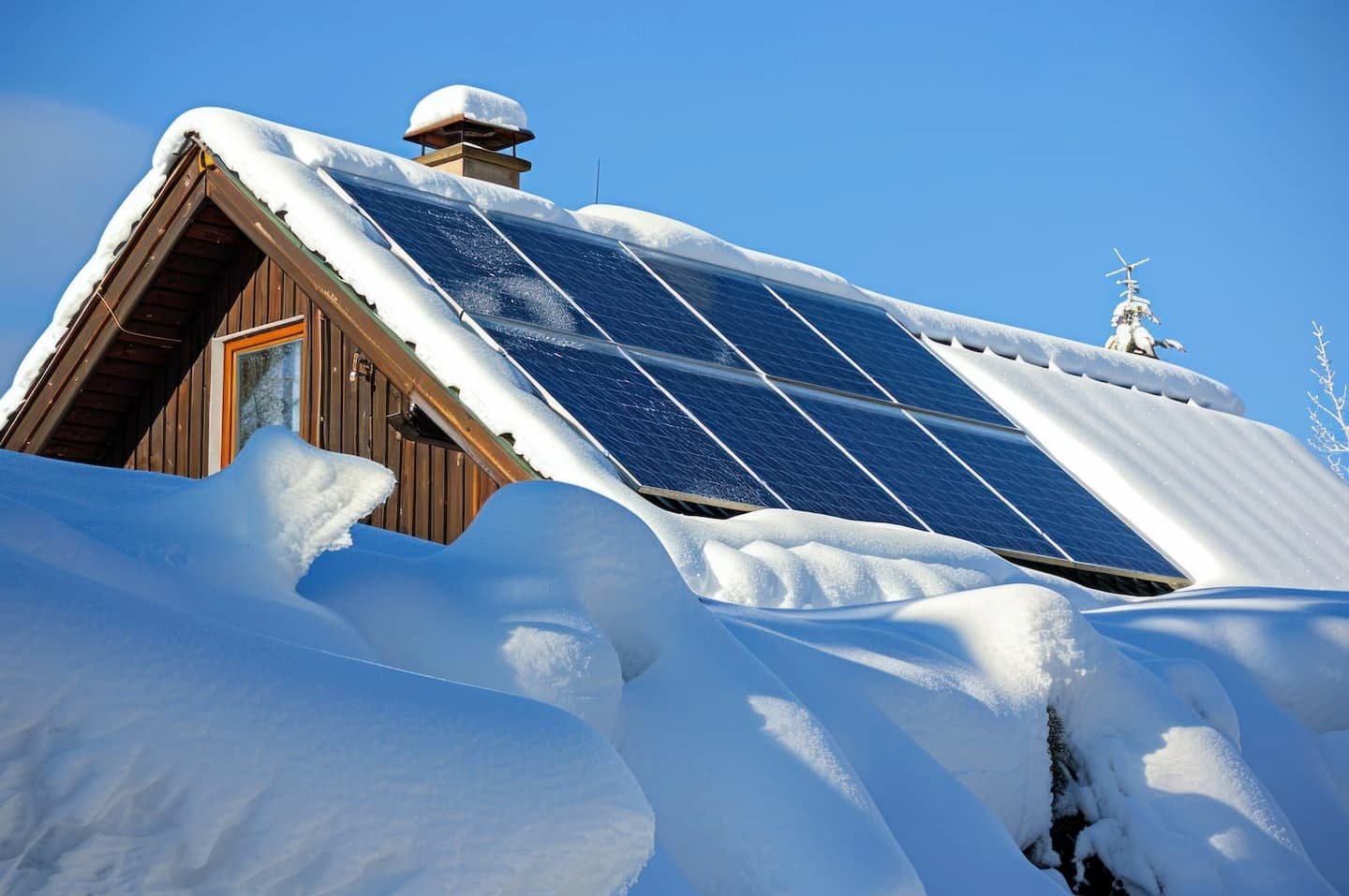 close-up-solar-panel-winter-sunny-day-snowcovered-rooftop (1) (1)